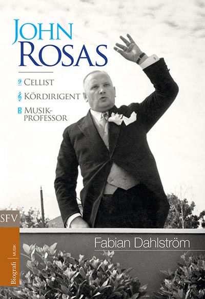 Pärmen på John Rosas-biografin visar John rosas i dirigentens roll